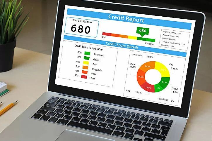 A computer screen reflecting a credit report.